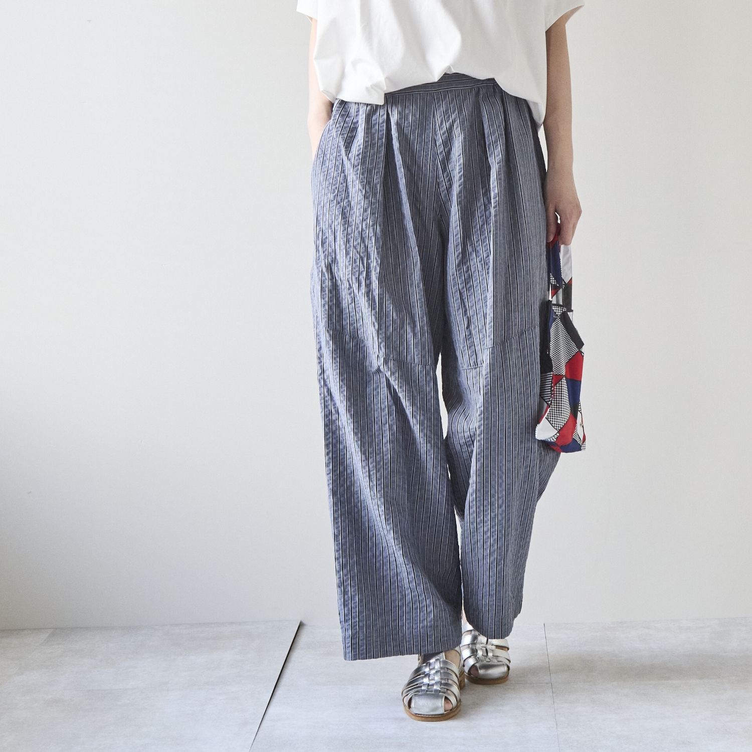 Kilka/風が通るストライプのカーブパンツ
